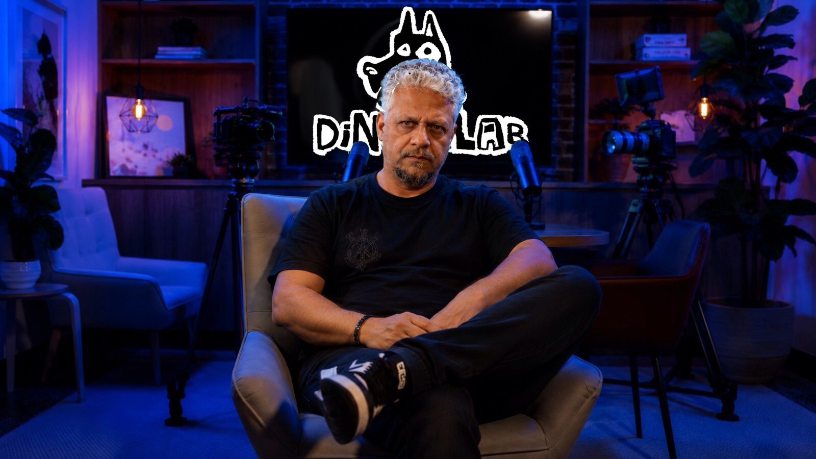 Fabio Nogueira seated in the Dingo Lab studio